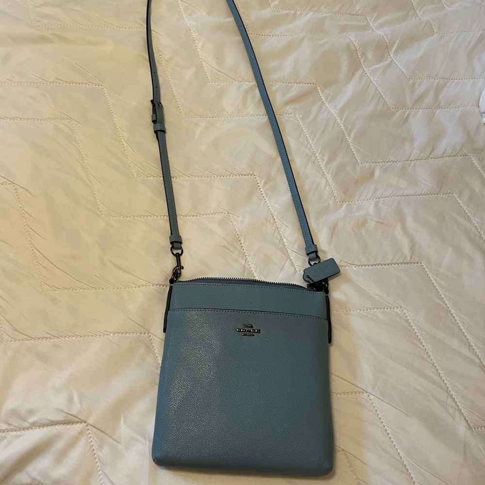 Coach purse and wallet.  Used only 1-2 times and less than 2 years old.